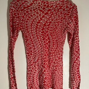 Cute unbranded stretch and sheer sweater